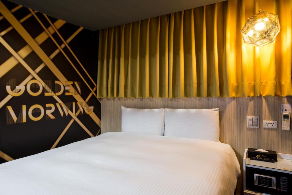 Postel nebo postele na pokoji v ubytování Morwing Hotel - Culture Vogue