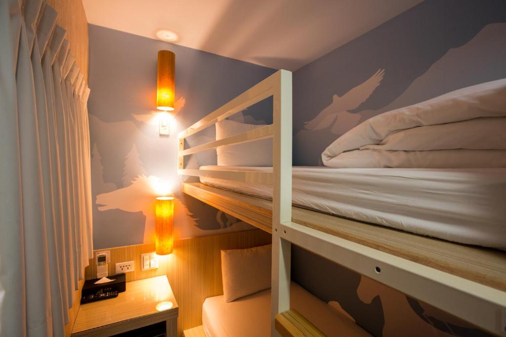 Postel nebo postele na pokoji v ubytování Morwing Hotel - Culture Vogue