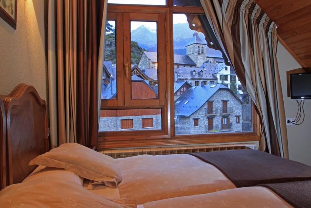 Postel nebo postele na pokoji v ubytování Hotel-Aparthotel El Reyno