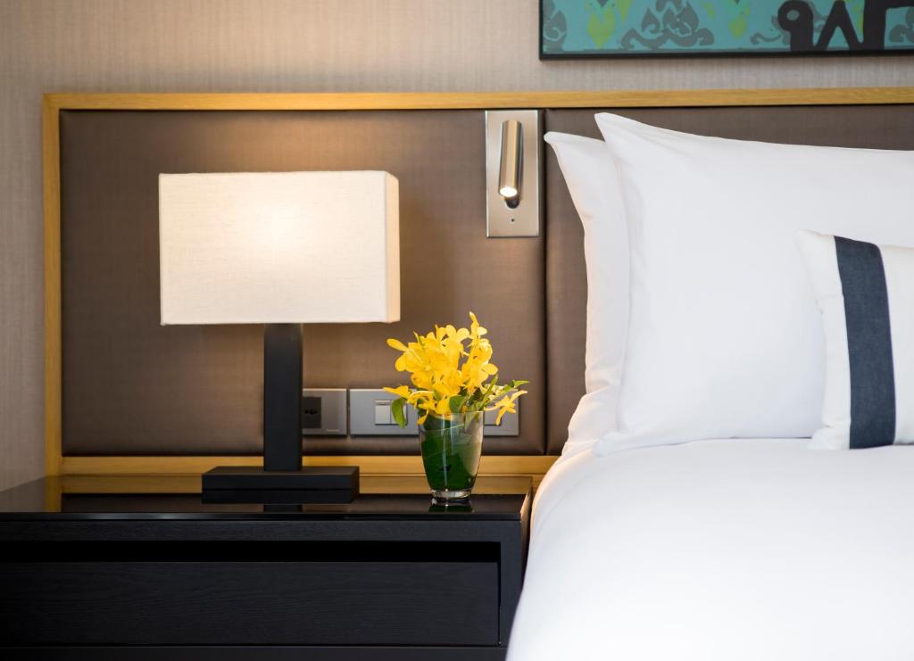 Postel nebo postele na pokoji v ubytování Travelodge Sukhumvit 11