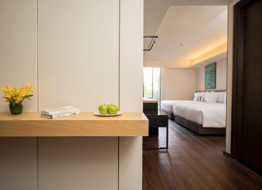Postel nebo postele na pokoji v ubytování Travelodge Sukhumvit 11