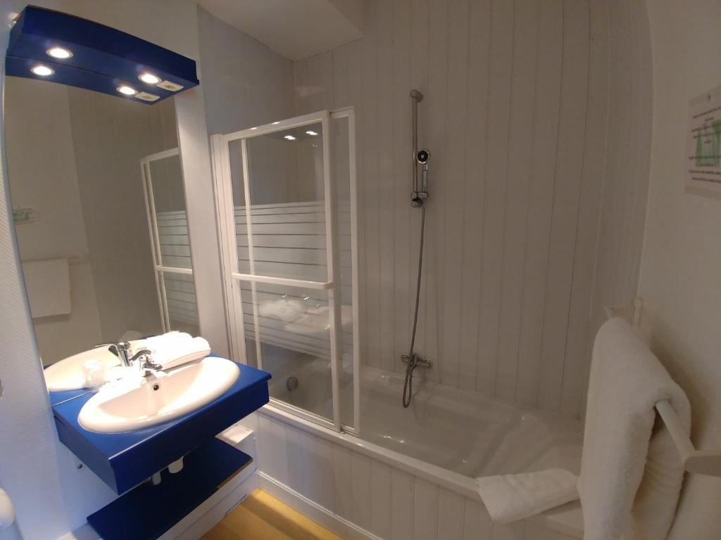 Koupelna v ubytování Hôtel Agena