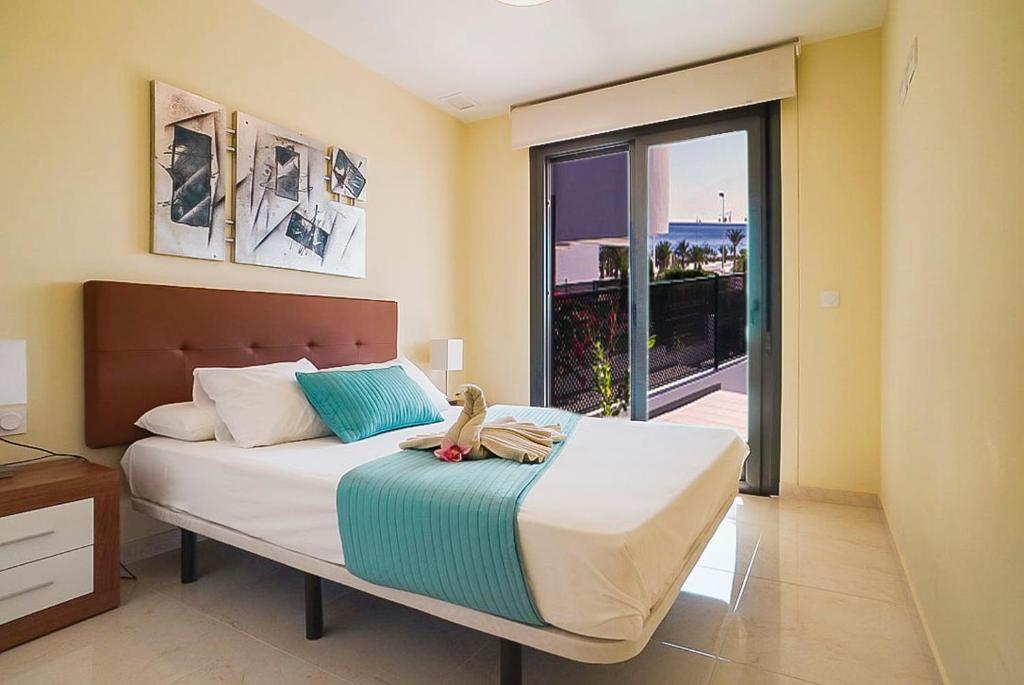 Postel nebo postele na pokoji v ubytování Ocean View Apartment