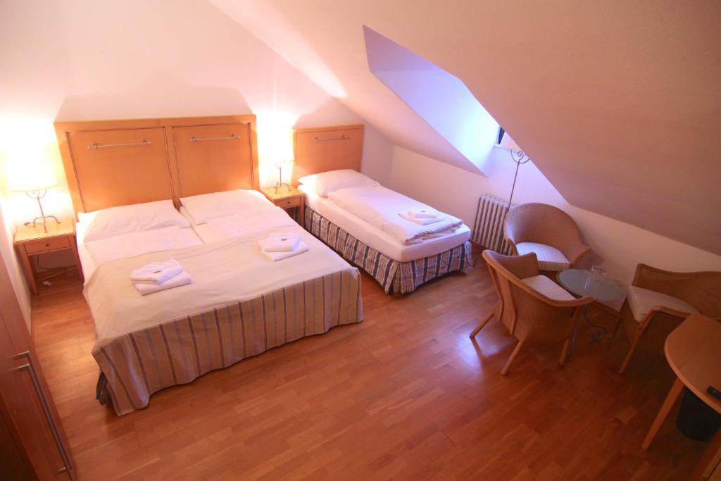 Postel nebo postele na pokoji v ubytování Hotel Klika