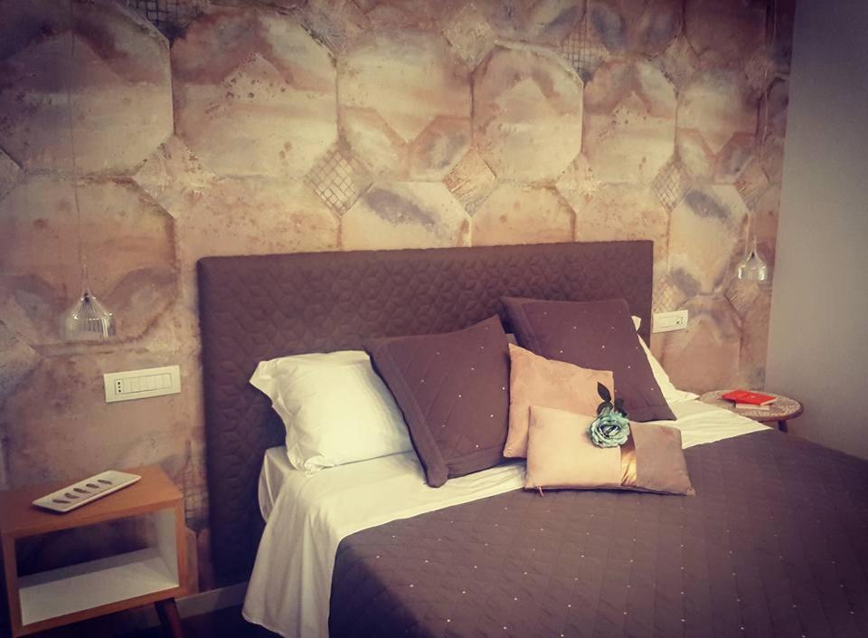 Postel nebo postele na pokoji v ubytování B&B Parini