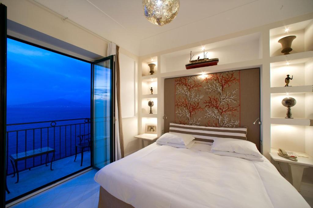 Cama ou camas em um quarto em Bellevue Syrene