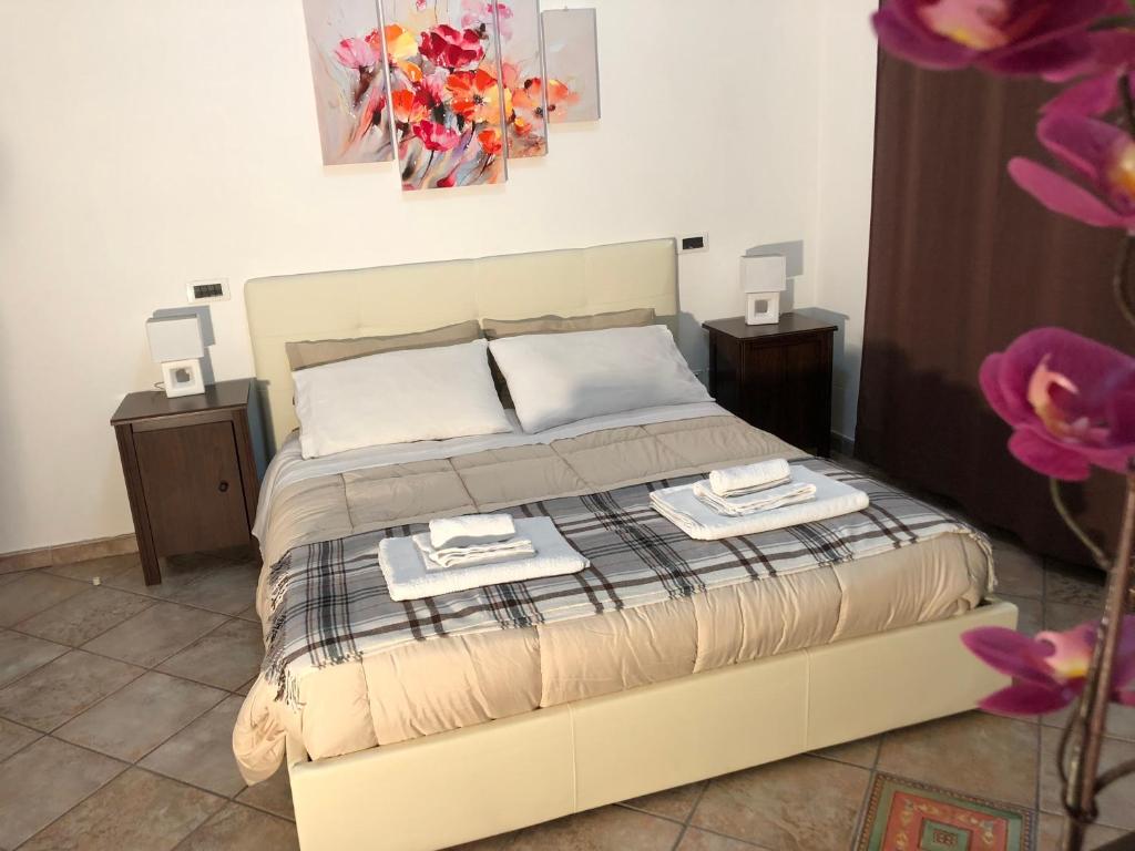 Postel nebo postele na pokoji v ubytování B&B Villa Loriana