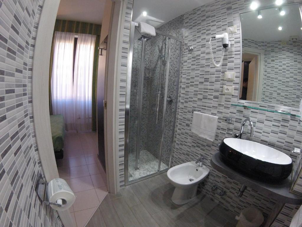 Koupelna v ubytování Hotel Perugino