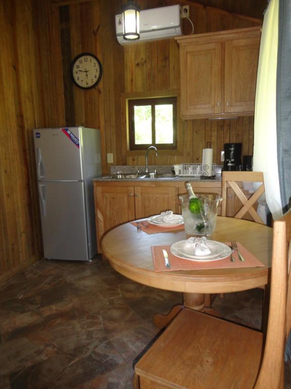 Köök või kööginurk majutusasutuses J and H Garden Cabinas