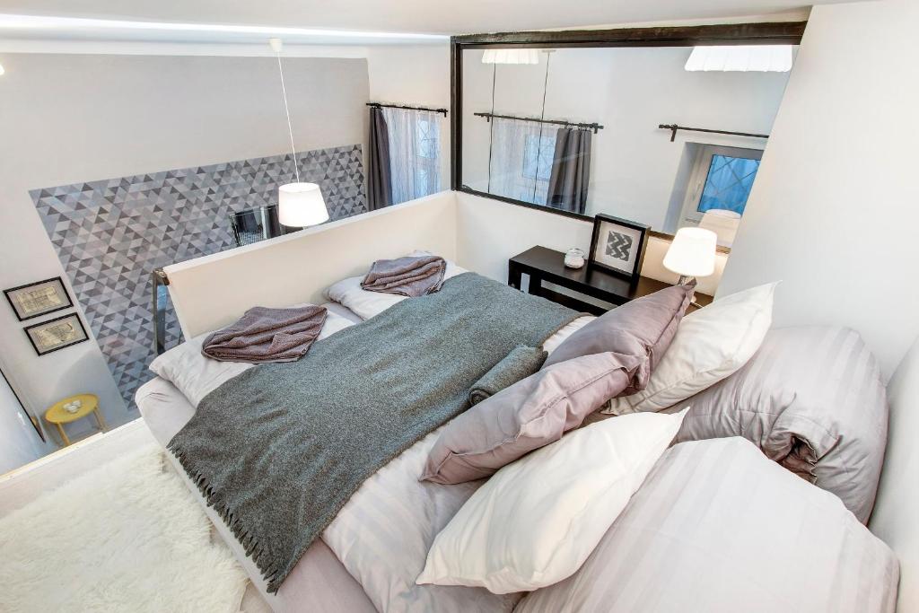 Posteľ alebo postele v izbe v ubytovaní Stylish Suite WestEnd