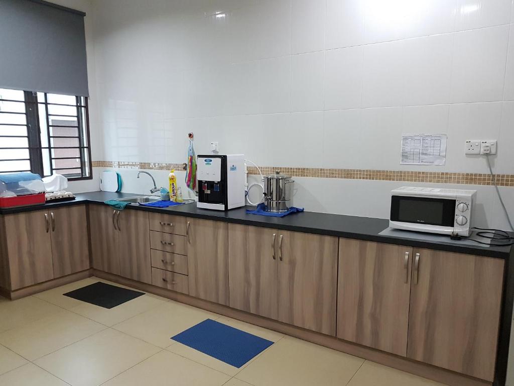 Kuchyň nebo kuchyňský kout v ubytování Jonker 88 Homestay Melaka