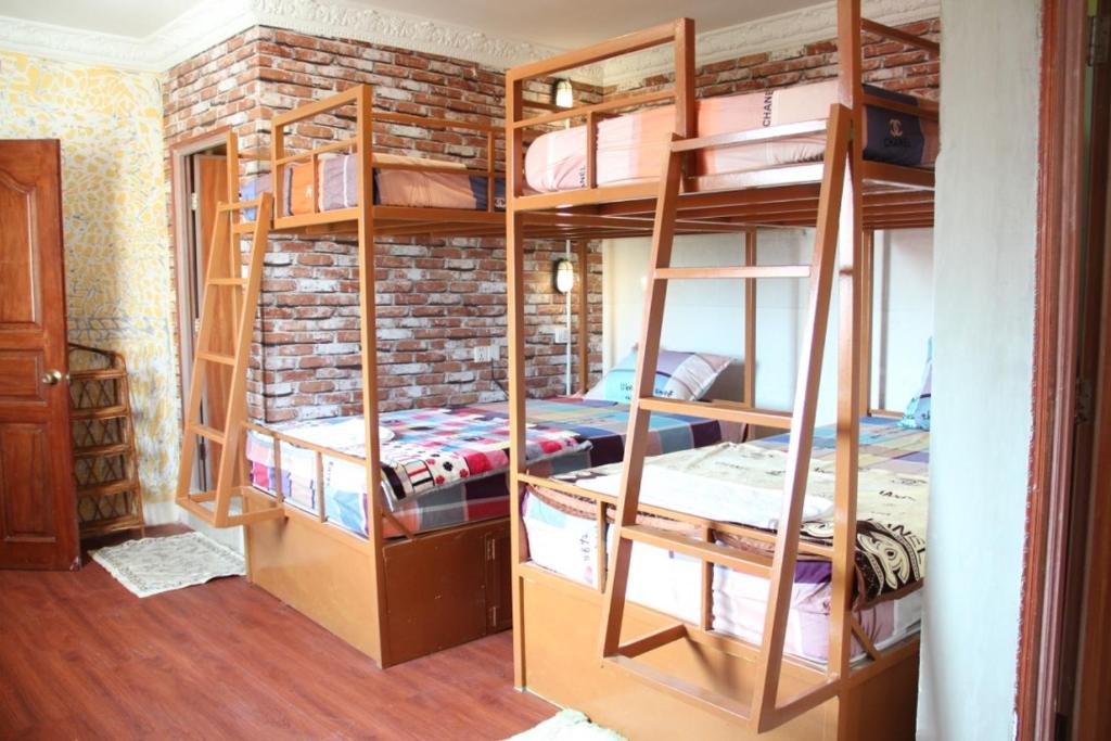 Postel nebo postele na pokoji v ubytování Pich Guesthouse