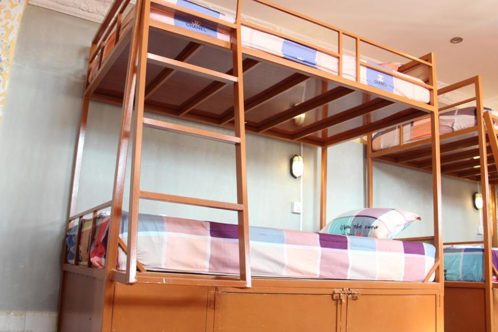 Postel nebo postele na pokoji v ubytování Pich Guesthouse