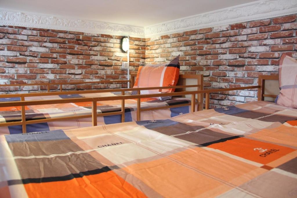 Postel nebo postele na pokoji v ubytování Pich Guesthouse