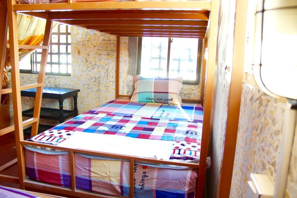 Postel nebo postele na pokoji v ubytování Pich Guesthouse
