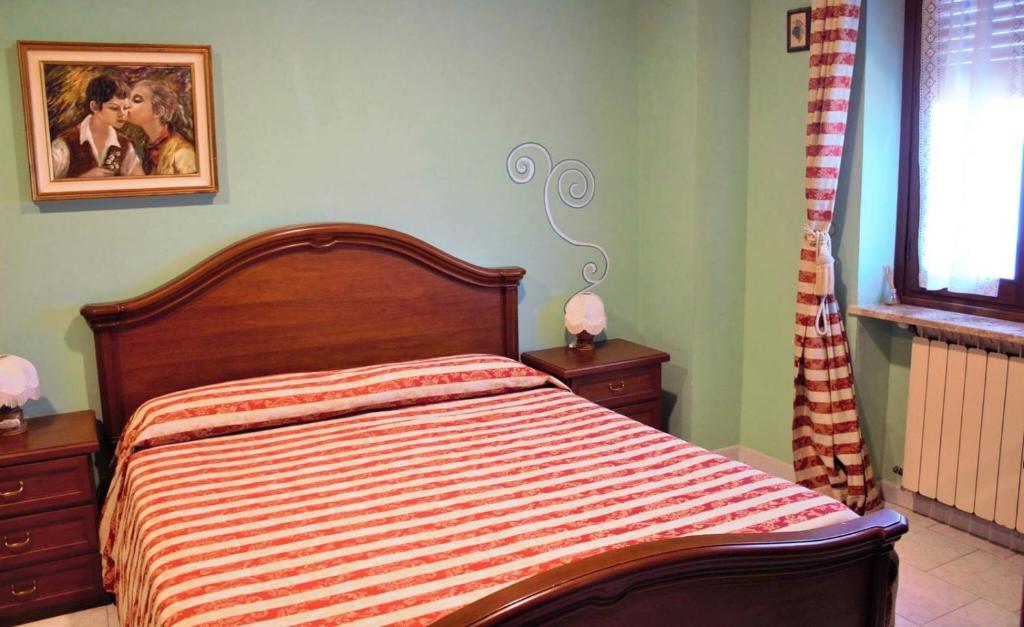 Postel nebo postele na pokoji v ubytování Ristorante Albergo 'l Bunet