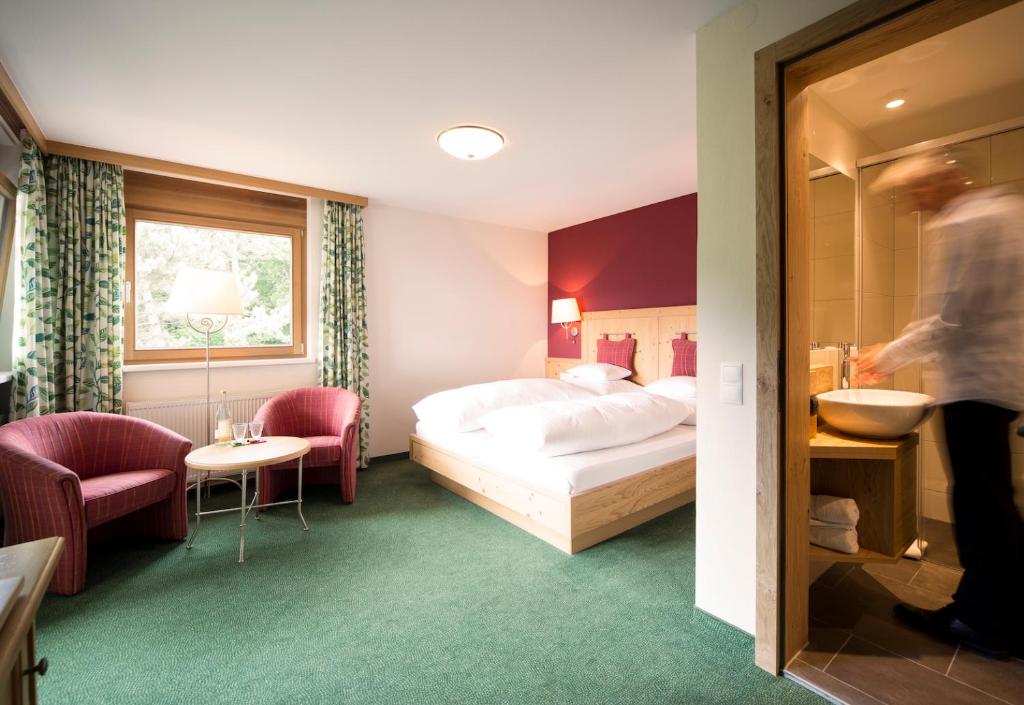 Postel nebo postele na pokoji v ubytování Landhaus Maria Grün B&B