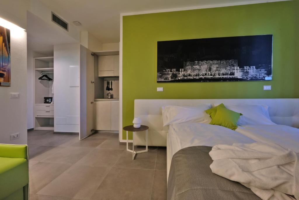 Postel nebo postele na pokoji v ubytování Relais Villa Clodia