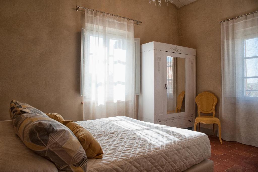 Łóżko lub łóżka w pokoju w obiekcie Villa Ventotto