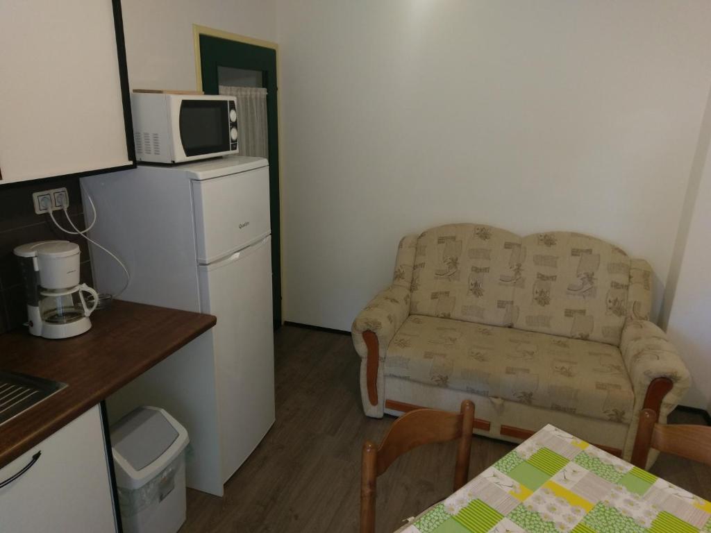 Kuchyň nebo kuchyňský kout v ubytování Apartments Ingrid