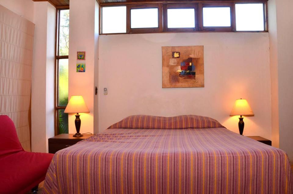 Postel nebo postele na pokoji v ubytování Villas la Paz