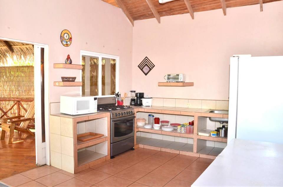 Kuchyň nebo kuchyňský kout v ubytování Villas la Paz