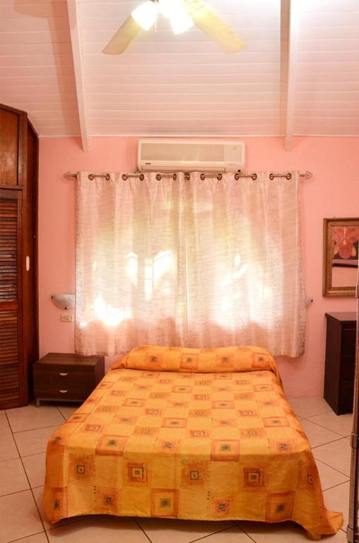 Postel nebo postele na pokoji v ubytování Villas la Paz