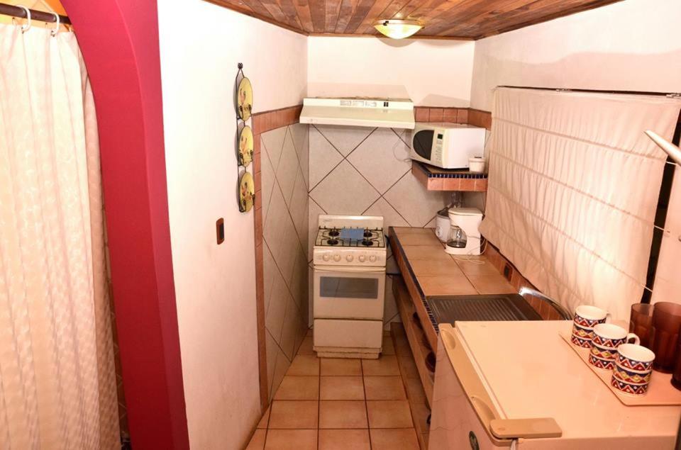 Kuchyň nebo kuchyňský kout v ubytování Villas la Paz