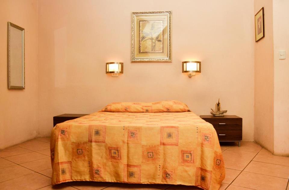 Postel nebo postele na pokoji v ubytování Villas la Paz