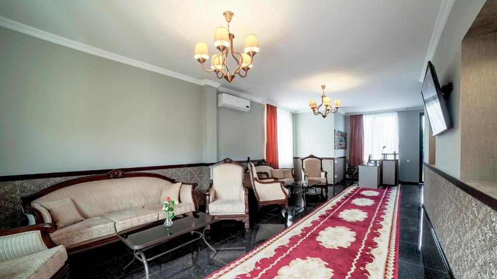 Posezení v ubytování Orange Hotel