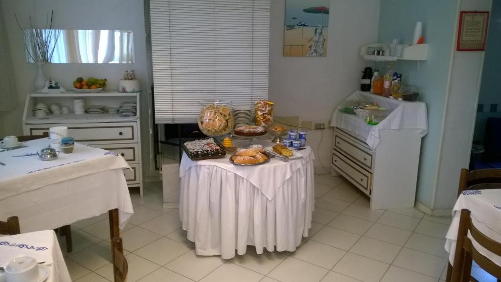 Kuchyň nebo kuchyňský kout v ubytování Albergo Maria Gabriella