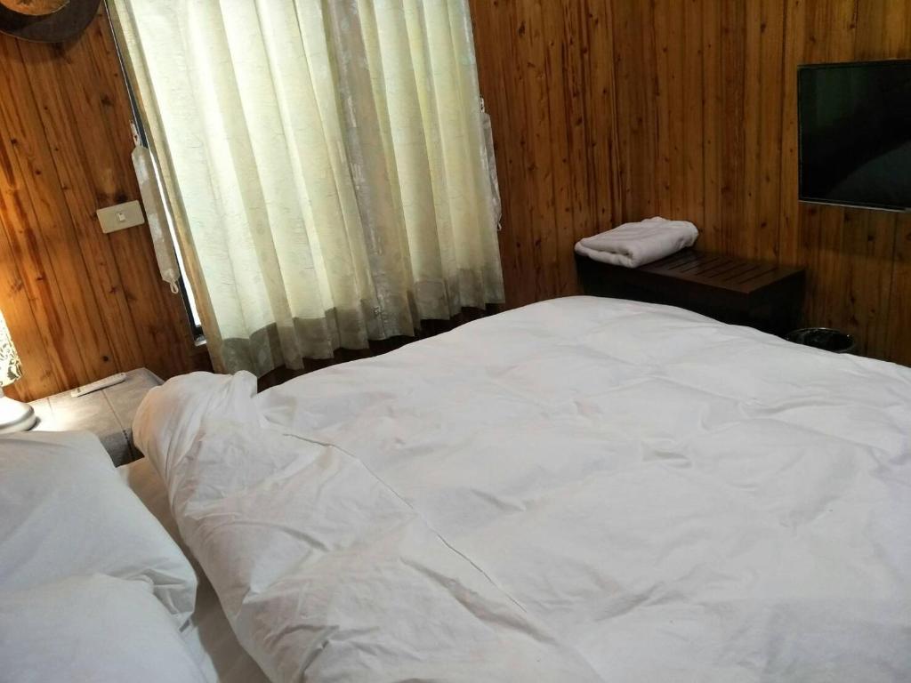 Postel nebo postele na pokoji v ubytování Yes, Sir Homestay