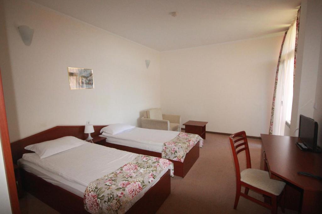 Katil atau katil-katil dalam bilik di Dafovska Hotel
