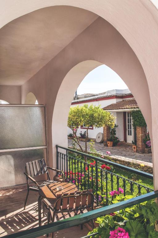A balcony or terrace at Iliada Beach Hotel
