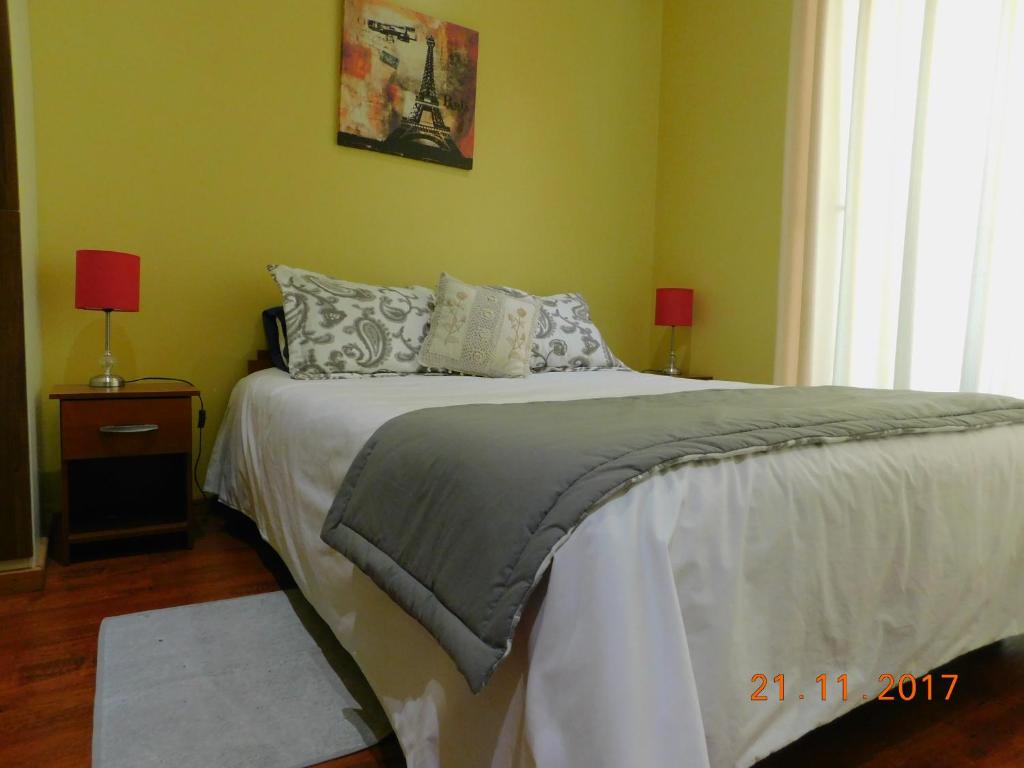 Postel nebo postele na pokoji v ubytování Apart Hotel Uman