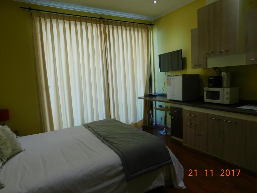 Kuchyň nebo kuchyňský kout v ubytování Apart Hotel Uman