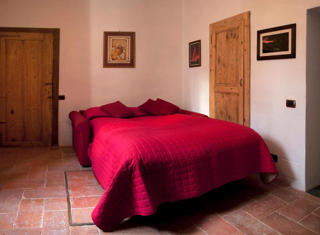 Postel nebo postele na pokoji v ubytování B&B Aquarelle