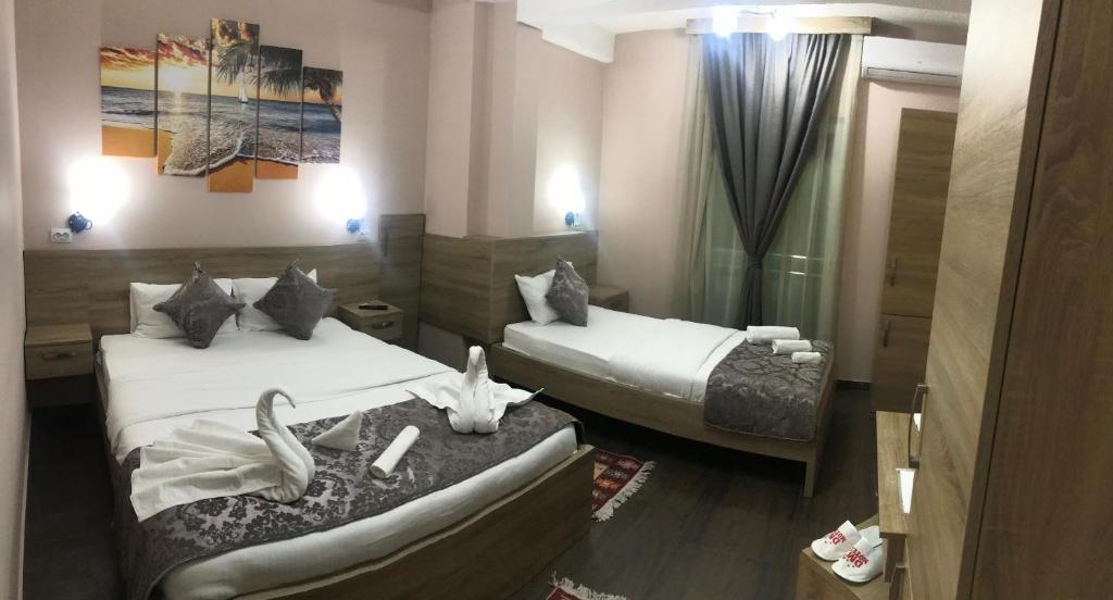 Postel nebo postele na pokoji v ubytování Prenociste DM5