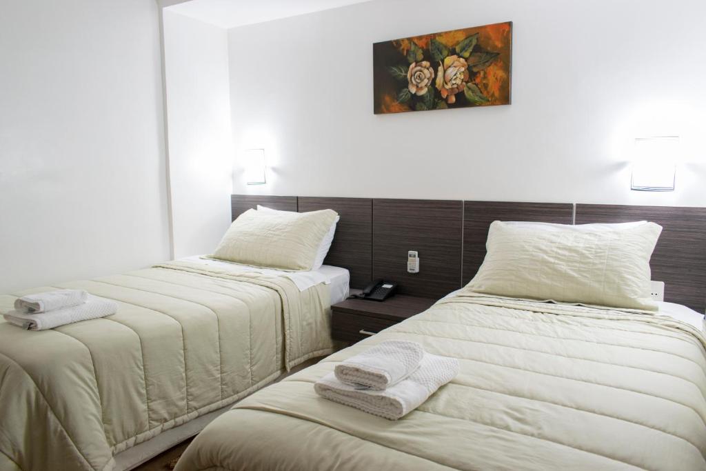 Letto o letti in una camera di Müller Hotel