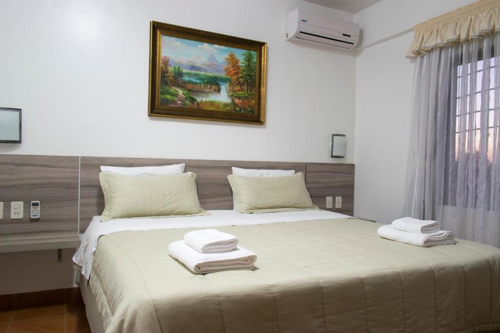 Letto o letti in una camera di Müller Hotel