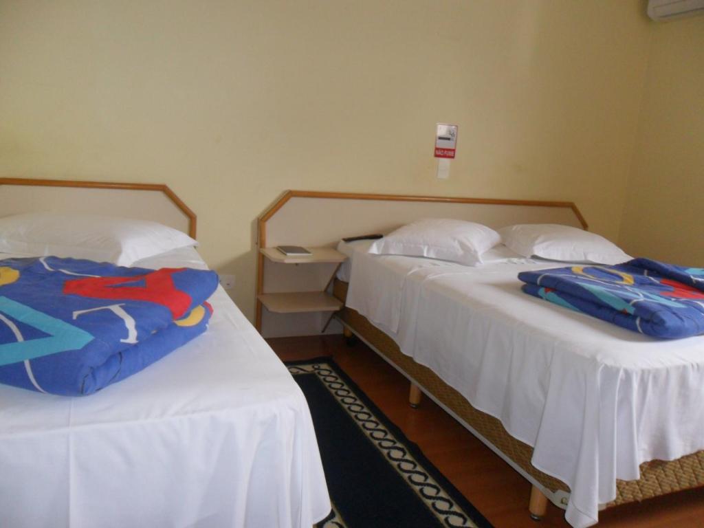 Postel nebo postele na pokoji v ubytování Pousada da Serra