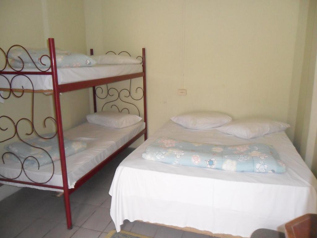 Postel nebo postele na pokoji v ubytování Pousada da Serra