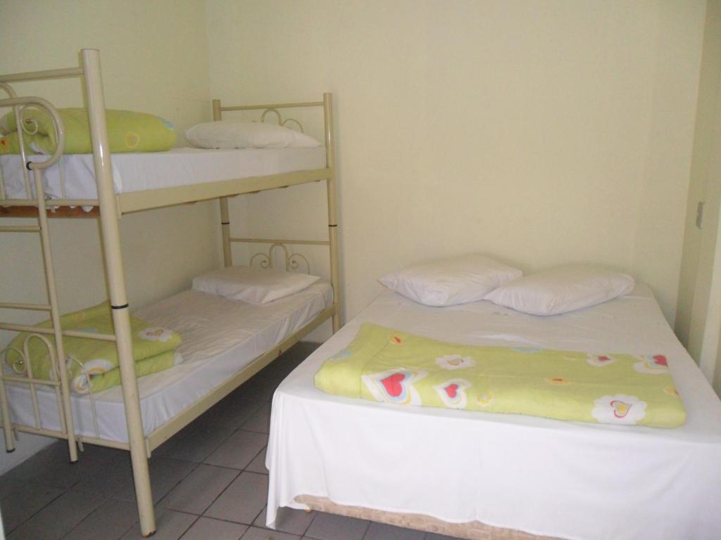 Postel nebo postele na pokoji v ubytování Pousada da Serra