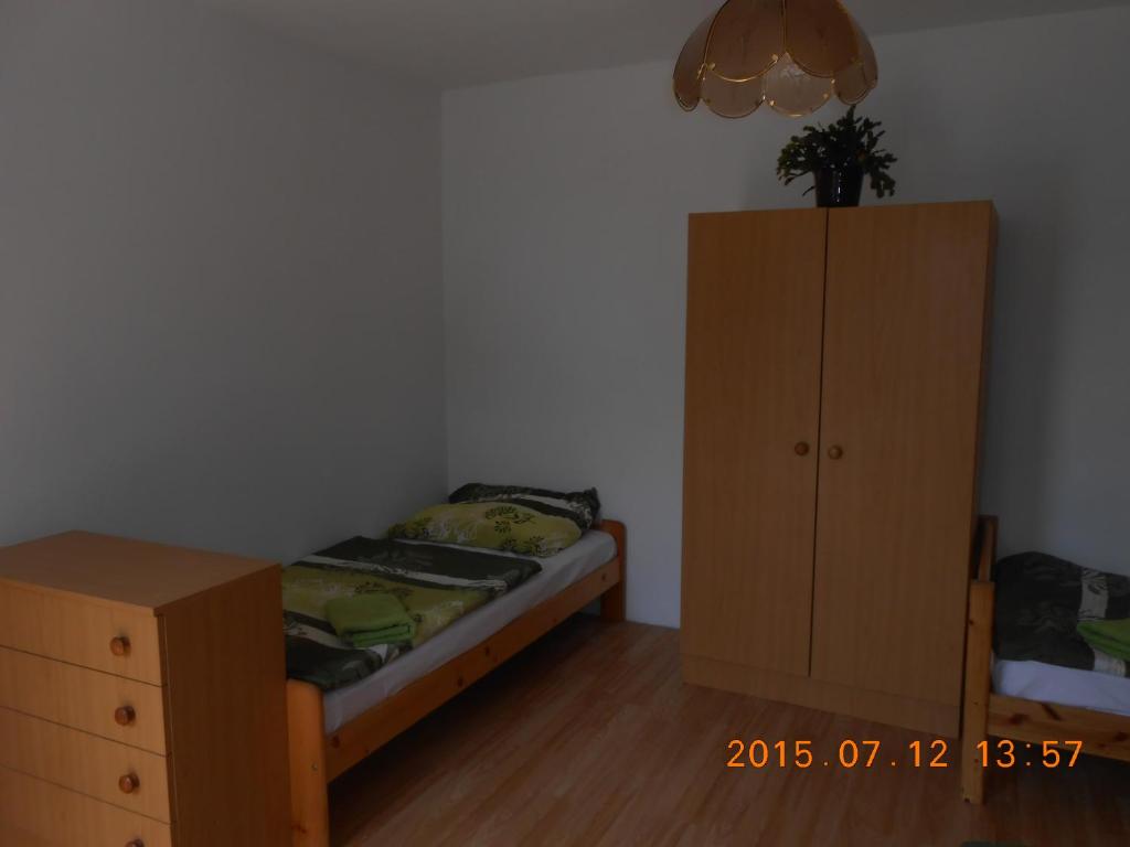 Postel nebo postele na pokoji v ubytování Apartmán Kamila