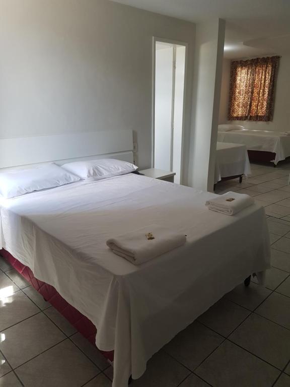 Postel nebo postele na pokoji v ubytování Leal Classic Hotel