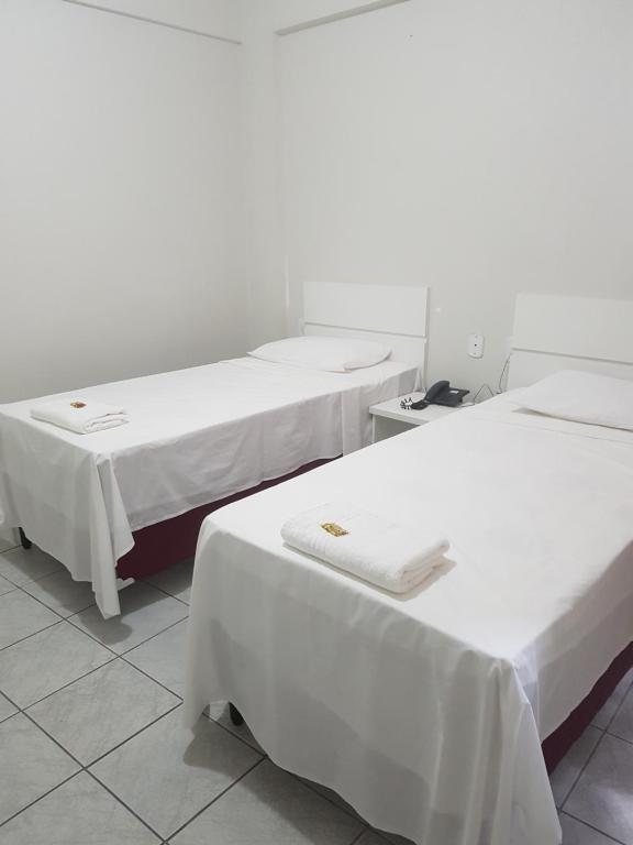 Postel nebo postele na pokoji v ubytování Leal Classic Hotel