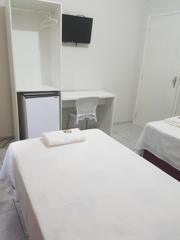 Postel nebo postele na pokoji v ubytování Leal Classic Hotel