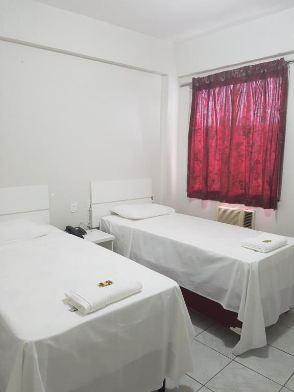 Postel nebo postele na pokoji v ubytování Leal Classic Hotel