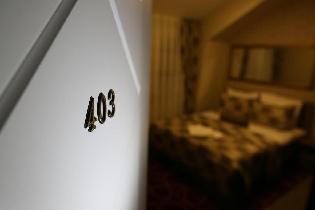 Postel nebo postele na pokoji v ubytování Hotel Pejton