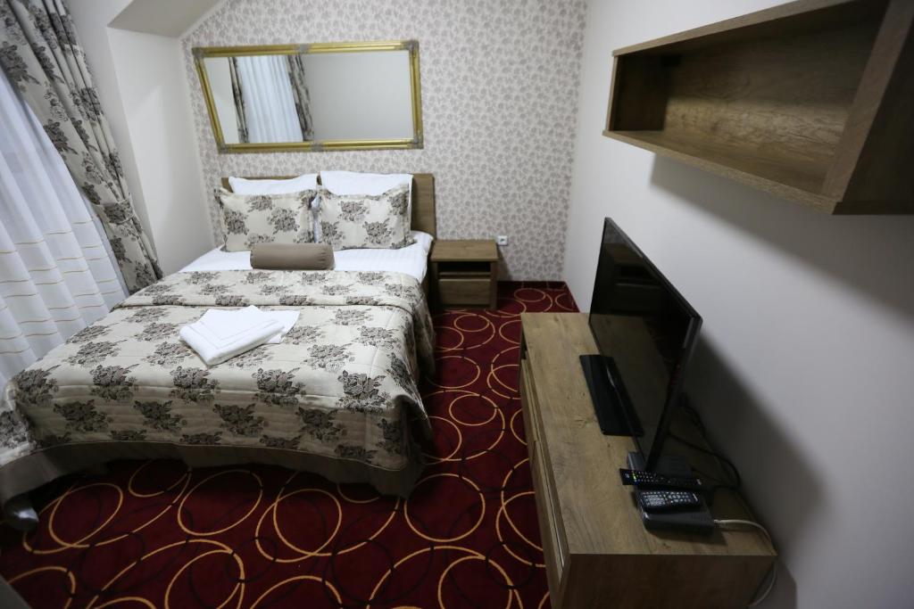 Postel nebo postele na pokoji v ubytování Hotel Pejton